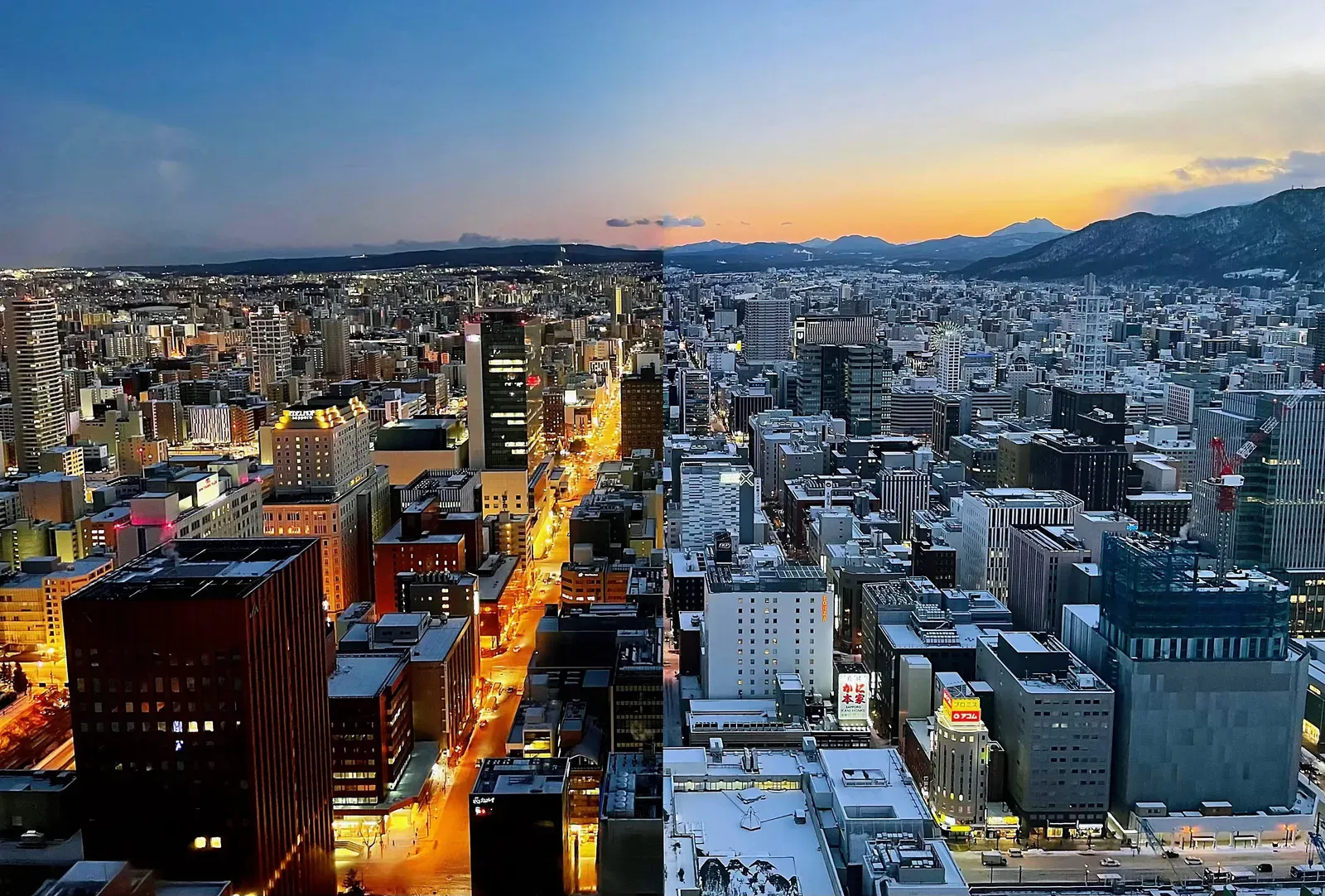 Snow-dusted city blocks running toward distant mountains at dusk.